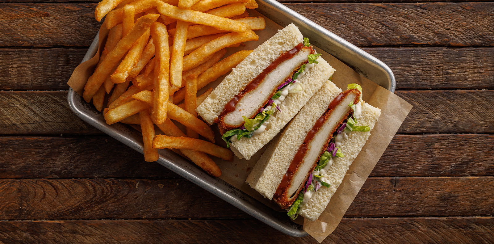 Panko chicken breast, cabbage, yuzu + pepper aioli & katsu sauce on milk bread